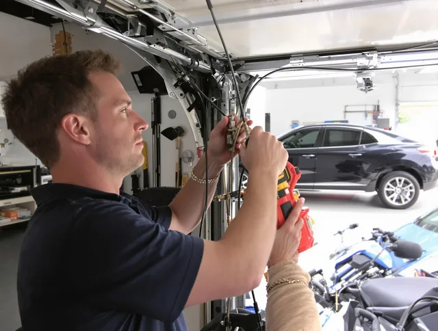La Habra Garage Door Repair safety certified technician performing cable replacement in La Habra