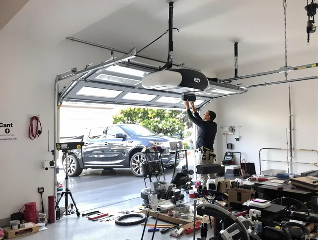 La Habra Garage Door Repair specialist installing smart garage door opener system in La Habra home